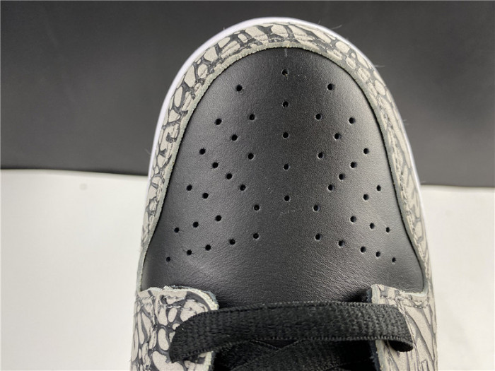 S*p*e × Nike SB Dunk Low “Black Cement 304292-131